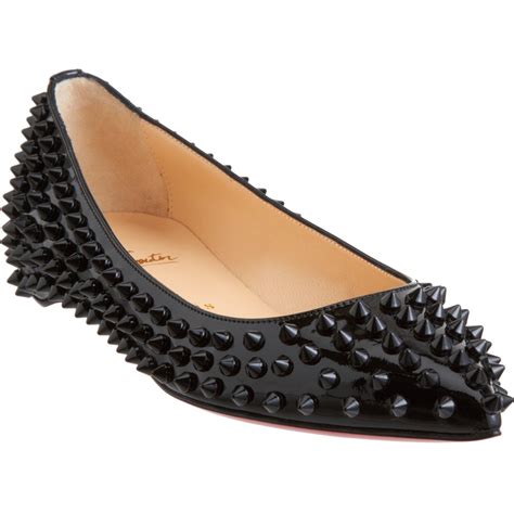 christian louboutin flats with spikes.